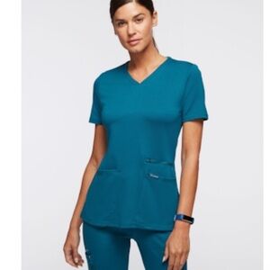 Used jaanuu scrub set Caribbean blue